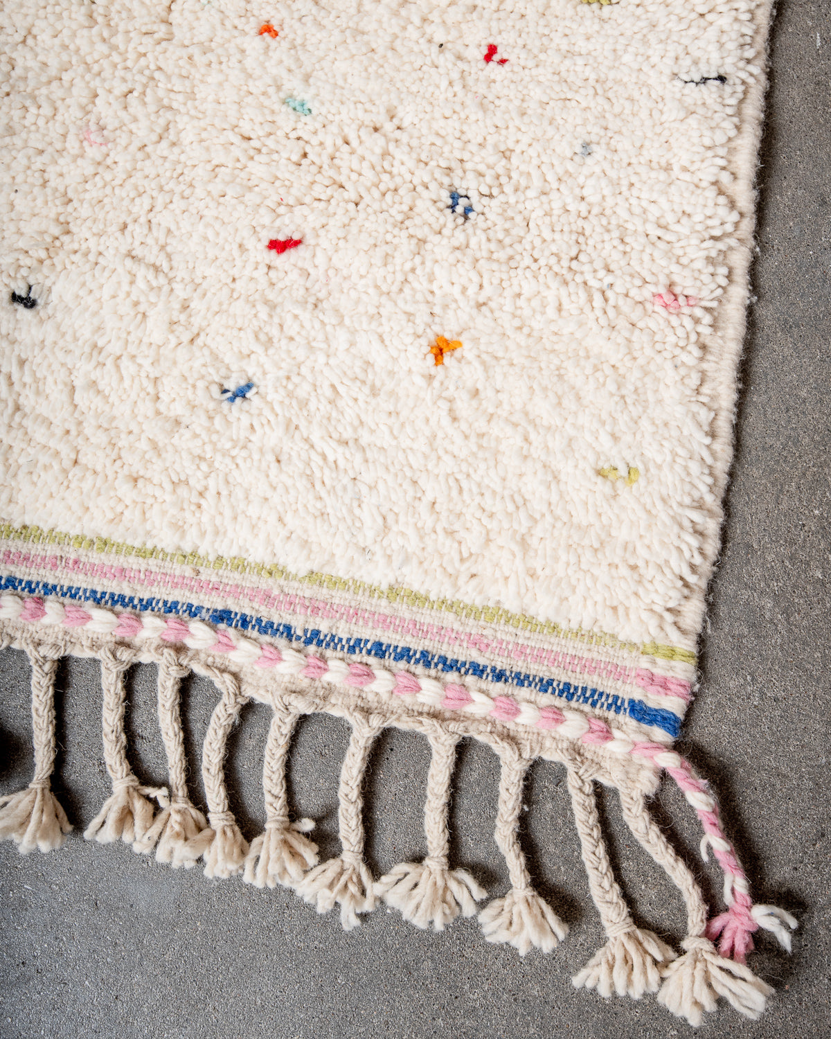 Modern, designer, handcrafted Berber rug from Morocco. Beniourain carpet with beautiful colours and patterns and fluffy wool texture.